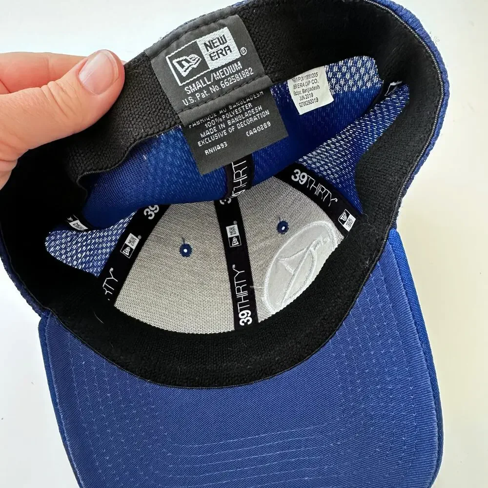 Sport-Tek blue emblem